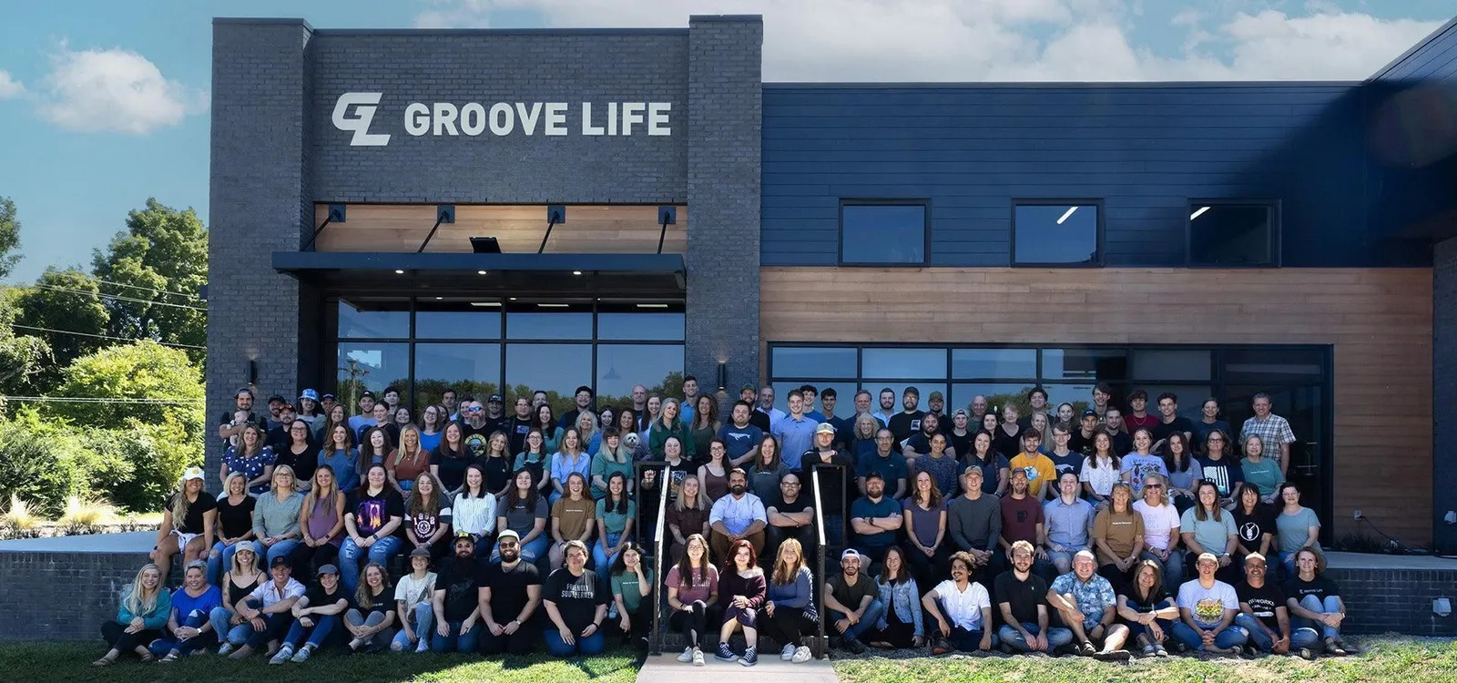 The Groove Life team gathered in front of the Groove Life building in Spring Hill, Tennessee
